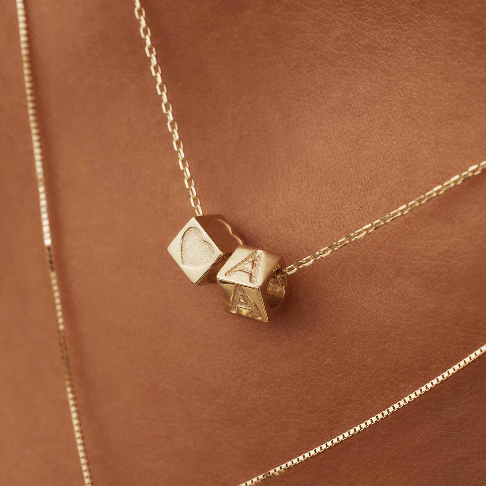 Le Marais Felie 14 karat gold cube initial charm with letter -  - Isabel Bernard