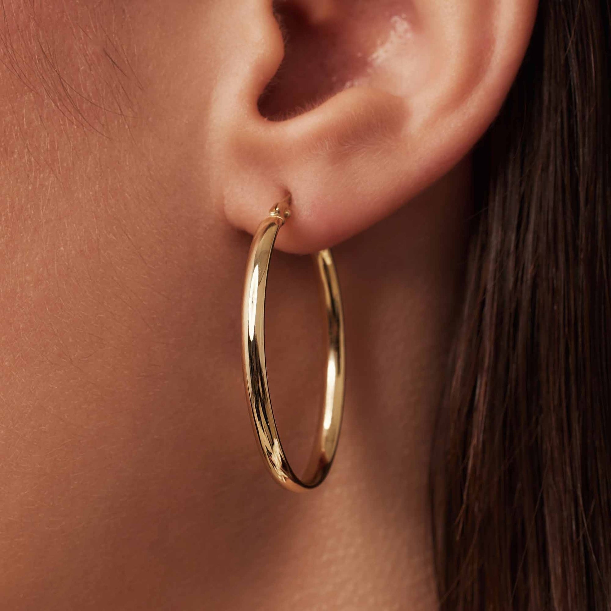 Rivoli Flori 14 karat gold oval hoop earrings (32 mm) -  - Isabel Bernard